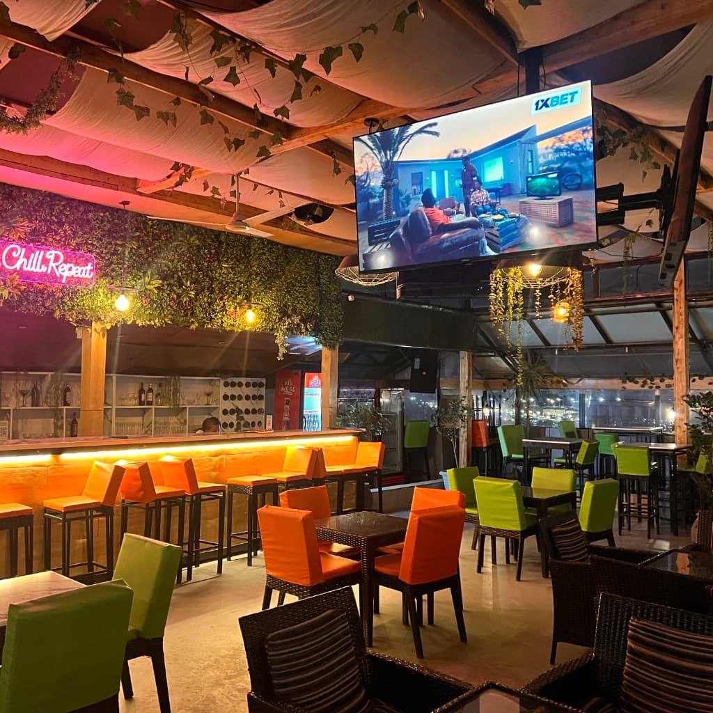 Velvet rooftop bar at sunset overlooking the Bole, Addis Ababa skyline